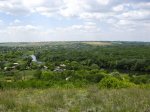 В жаркий полдень над рекой